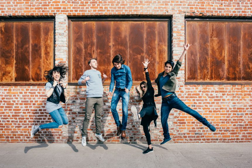 millennials jumping in the air
